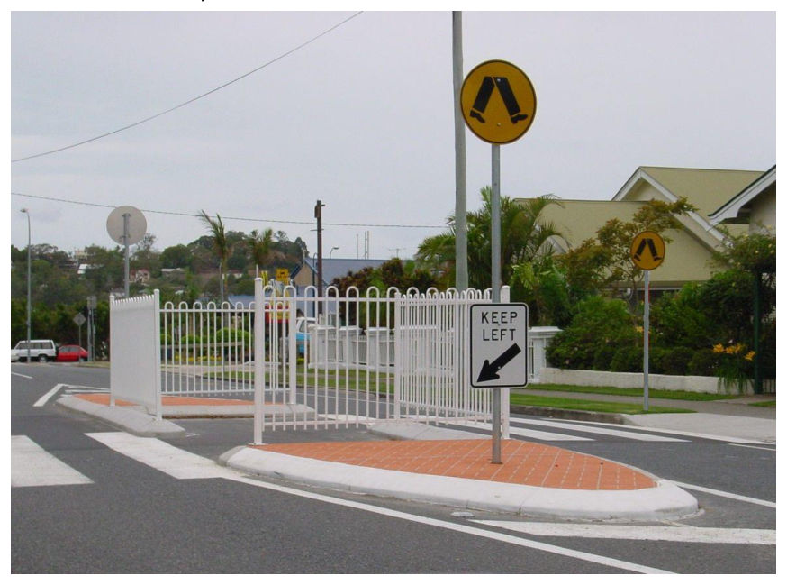 Figure 1.1-F – New architectural fencing treatments that incorporate horizontal rails and also tend to obscure short pedestrians
