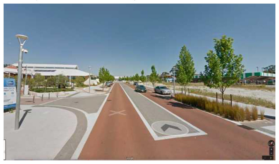Figure 6.1(i) – Cycle Street with central mountable hump with car parking. Example from Netherlands