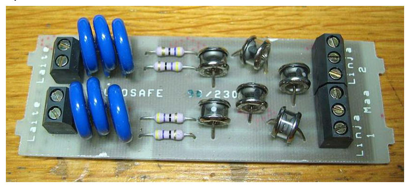 Figure 6.8.6(b) – Typical metal oxide varistors (blue) and gas discharge tubes (silver) for power circuit protection