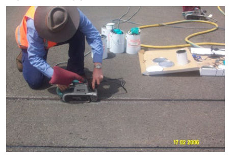 Figure 7.4.4.2(h) – Piezoelectric installation details (making epoxy level with road surface)